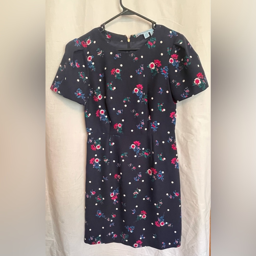 Draper James navy dress with floral and polka dots.